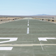 Numbers are painted on the runway at “Camp Wilson,” part of the Marine Corps Air Ground Combat Center at Twentynine Palms in California (USMC photo)